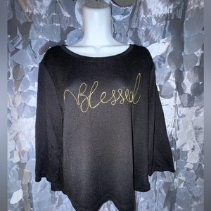 Elegant Black Long Sleeve Top with Gold Script